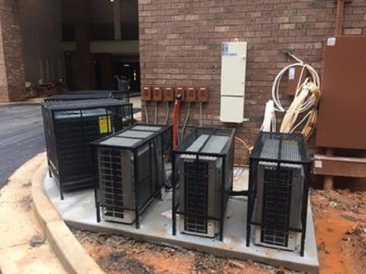 Outdoor utility equipment protected by a security cage